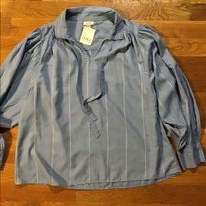 Woman’s new with tags size large top/blouse